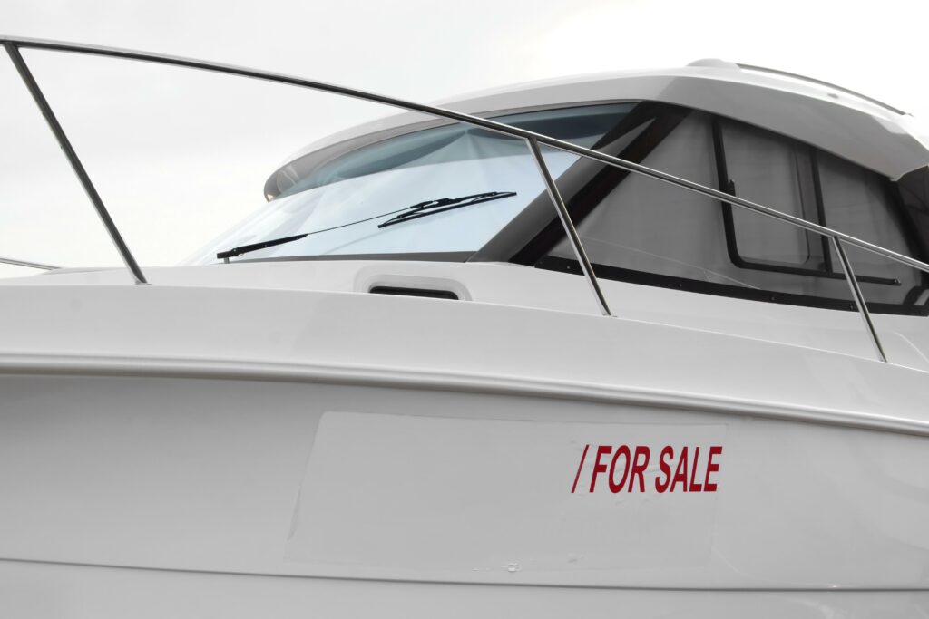 Boat with a For Sale sign