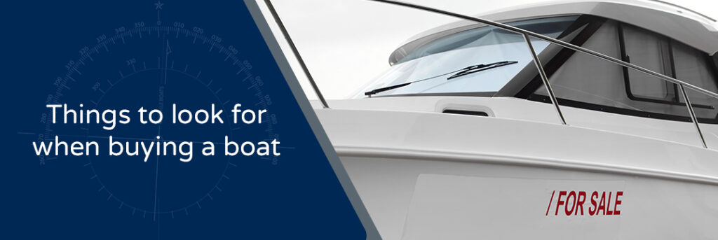 Things to look for when buying a new boat - image of a boat with a for sale sign