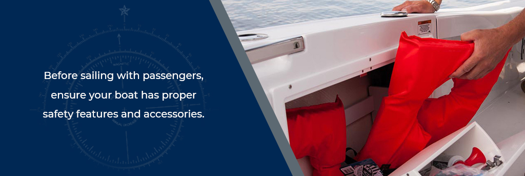 Before sailing with passengers, ensure your boat has property safety features and accessories - Close up of a person putting a life jacket in a storage compartment