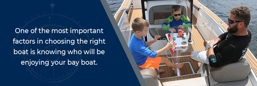One of the most important factors in choosing the right boat is knowing who will be enjoying your bay boat - Man and children seated at a table and cushioned seats on the deck of a Crevalle bay boat