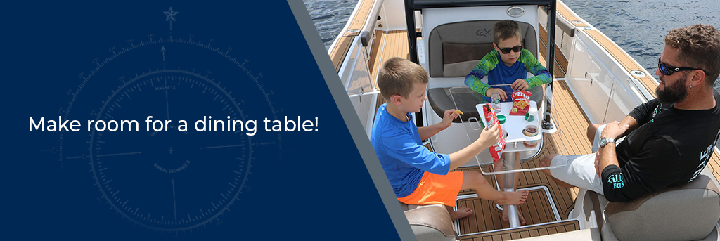 Make room for a dining table - father and two boys eating at an acrylic table on board their boat