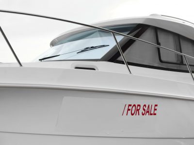 Boat with a For Sale sign